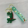 Creative cartoon Internet celebrity figurines, dinosaur cars, silicone pvc keychains, ins cute pendants, bags, couple pendants Application Scenario